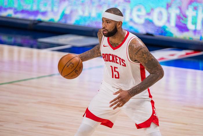 Jan 23, 2021; Dallas, Texas, USA; Houston Rockets center DeMarcus Cousins (15) looks to pass the ball during the second half against the Dallas Mavericks at the American Airlines Center. Mandatory Credit: Jerome Miron-USA TODAY Sports